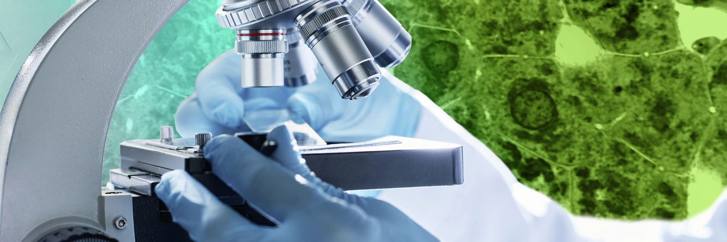 Gloved hands of young modern scientist preparing all the necessary equipment before carrying out new clinical experiment