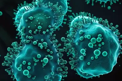 3D render close-up view of malignant cancer cells with spiky surface proteins and spherical shapes, shown in teal against a dark background.
