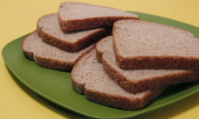 sliced bread on a green plate.