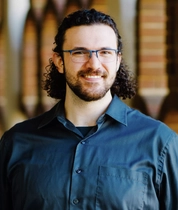 Headshot of Max Cravener, PhD