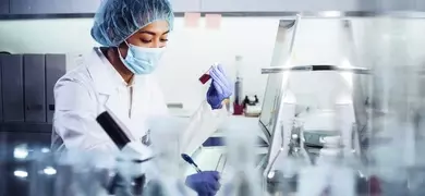 Asian female scientist working with pathogen samples