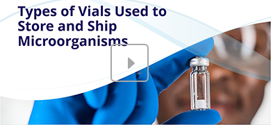 A person wearing blue gloves holds a small vial. The image includes the text: "Types of Vials Used to Store and Ship Microorganisms."