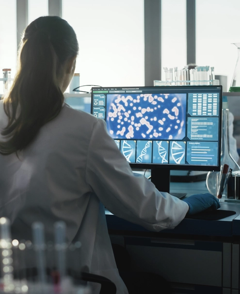 Female Scientist Working at Computer