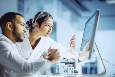 Scientists Working in The Laboratory iStock-1096502340.jpg