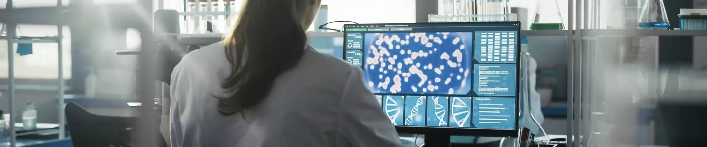Female Scientist Working at Computer